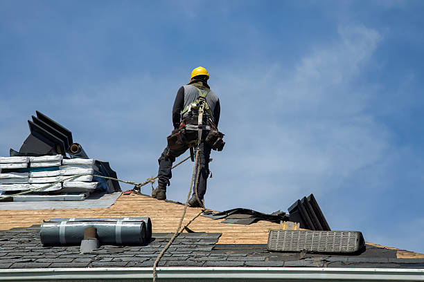 Professional Roof Replacement technician working in Jericho, VT